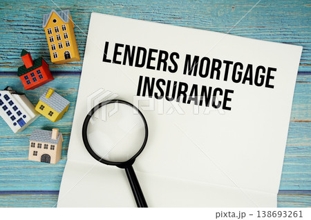 LMI Lenders Mortgage Insurance" with magnifying glass and house model on wooden background 138693261