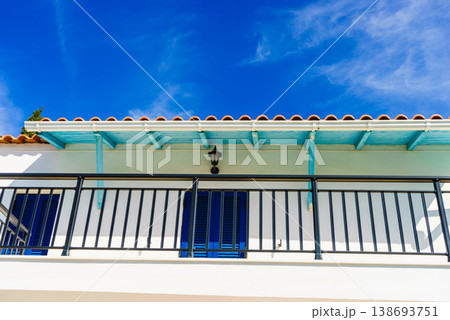 Greek blue window shutters Greek blue window shutters 138693751