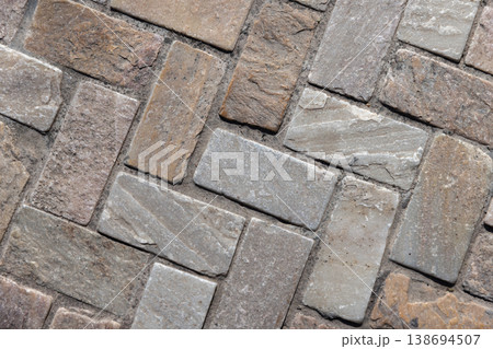 Close up of textured stone pavers, top viwq Close up of textured stone pavers, top viwq 138694507