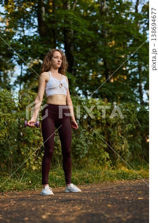 Natural light emphasizes relaxed posture and healthy lifestyle vibe Natural light emphasizes relaxed posture and healthy lifestyle vibe 138694677