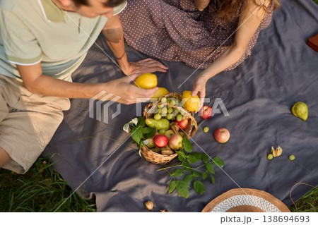 Quiet cityscape with outdoor feast as sunset paints sky 138694693
