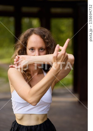 Dynamic scene of trainer demonstrating safety posture outdoors 138694732