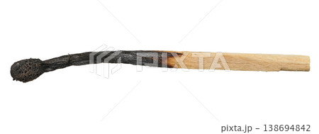 Burnt wooden match on isolated background, close up Burnt wooden match on isolated background, close up 138694842