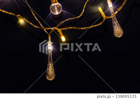 colorful christmas lights on blue festive holiday background colorful christmas lights on blue festive holiday background 138695133