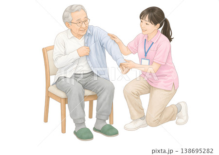 介護スタッフが高齢者の着替えを優しくサポートする介助シーン 138695282