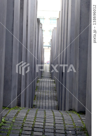 A passage between the concrete steles of the Holocaust memorial in Berlin. A passage between the concrete steles of the Holocaust memorial in Berlin. 138696012