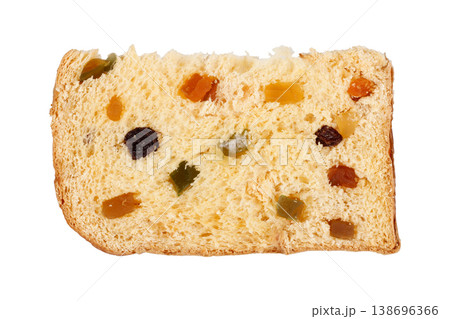 Traditional Christmas panettone, sliced and filled with candied fruit and raisins, set on a white background. A classic sweet bread from Italian cuisine. 138696366