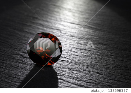 Red Ruby gemstone on stone background, close up shot 138696557