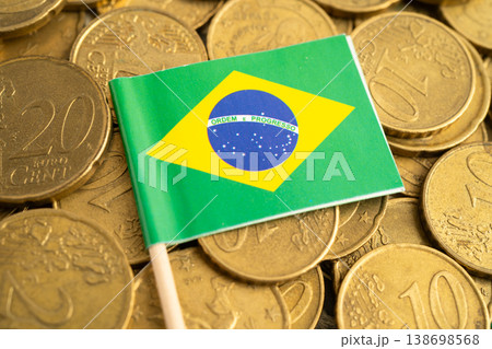 Brazil flag on coins money, finance and accounting, banking. Brazil flag on coins money, finance and accounting, banking. 138698568