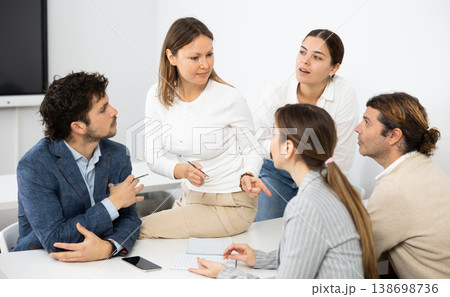 College students in study group preparing for test together College students in study group preparing for test together 138698736