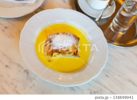 Popular confection is apple strudel with vanilla sauce 138699041