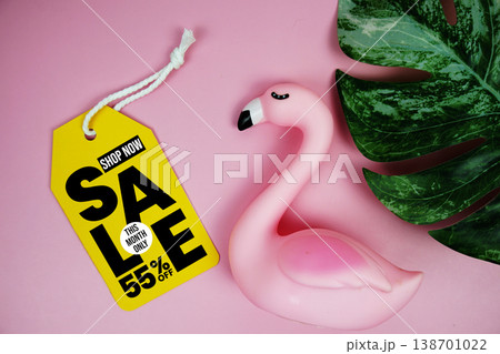 Price tag Sale 55% with summer decorations on pink background Price tag Sale 55% with summer decorations on pink background 138701022