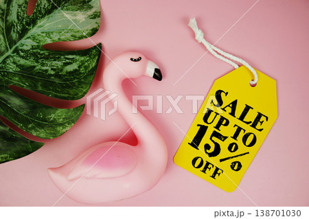 Price tag Sale 15% with summer decorations on pink background 138701030