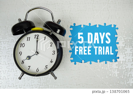 5 Days Free Trial text with alarm clock on blue background 5 Days Free Trial text with alarm clock on blue background 138701065