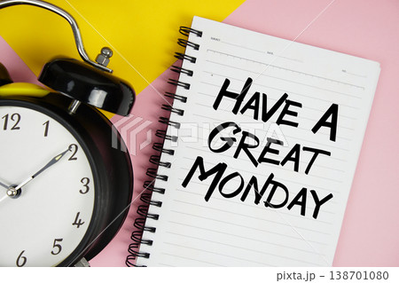 Have A Great Monday text written on notepad with alarm clock on pink background Have A Great Monday text written on notepad with alarm clock on pink background 138701080