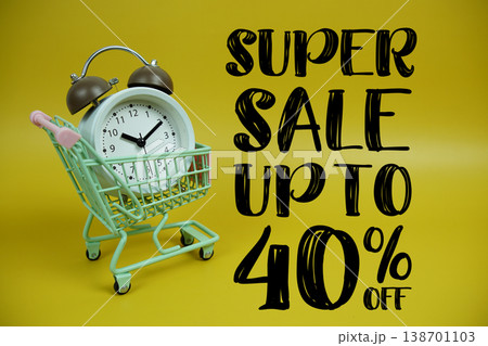 Super Sale 40% off Promotion and Marketing with trolley shopping cart and alarm clock on yellow background Super Sale 40% off Promotion and Marketing with trolley shopping cart and alarm clock on yellow background 138701103
