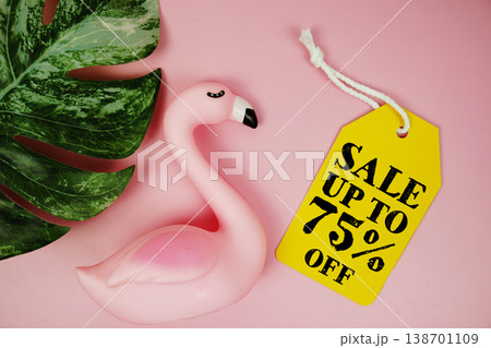 Price tag Sale 75% with summer decorations on pink background Price tag Sale 75% with summer decorations on pink background 138701109