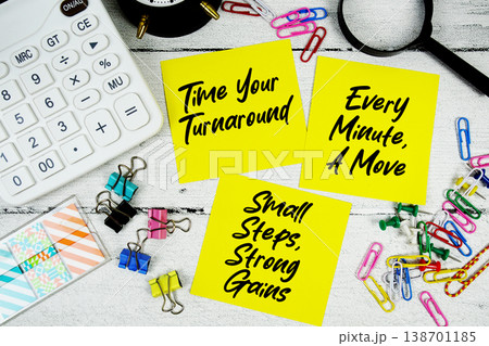 Time Your Turnaround, Every Minute, A Move, Small Steps, Strong Gains text written on paper note with calculator and magnifying glass on wooden background 138701185