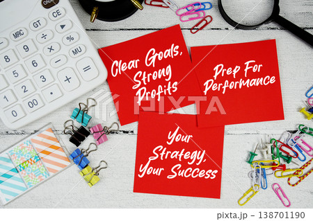 Clear Goals, Strong Profits, Prep For Performance, Your Strategy, Your Success text written on paper note with calculator and magnifying glass on wooden background Clear Goals, Strong Profits, Prep For Performance, Your Strategy, Your Success text written on paper note with calculator and magnifying glass on wooden background 138701190