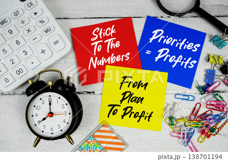 Stick To The Numbers, Priorities = Profits, From Plan To Profit text written on paper note with calculator and magnifying glass on wooden background Stick To The Numbers, Priorities = Profits, From Plan To Profit text written on paper note with calculator and magnifying glass on wooden background 138701194