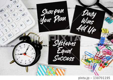 Sharpen Your Plan, Daily Wins Add Up, Systems Equal Success text written on paper note with calculator and magnifying glass on wooden background Sharpen Your Plan, Daily Wins Add Up, Systems Equal Success text written on paper note with calculator and magnifying glass on wooden background 138701195