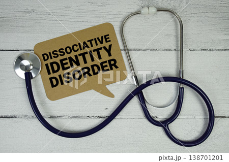 Dissociative Identity Disorder text with Medical Stethoscope on wooden background Dissociative Identity Disorder text with Medical Stethoscope on wooden background 138701201