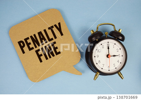 Penalty Fine text with alarm clock on blue background 138701669