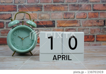 Wooden Calendar Showing the Date of April 10th. Day 10 of April month Wooden Calendar Showing the Date of April 10th. Day 10 of April month 138701919