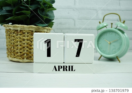Wooden Calendar Showing the Date of April 17th. Day 17 of April month 138701979
