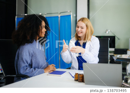 Professional healthcare scene featuring a doctor performing a patient checkup in a clinical setting Professional healthcare scene featuring a doctor performing a patient checkup in a clinical setting 138703495