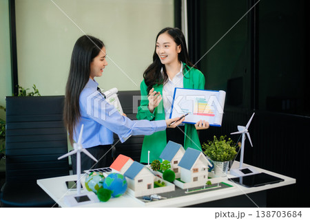 Business team people planning hand using laptop for working technology and business Net zero Business team people planning hand using laptop for working technology and business Net zero 138703684