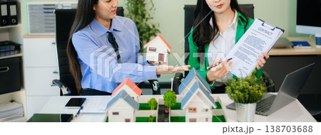 Signing a contract. Client and broker agent, lease agreement, successful deal and  Young business sitting 138703688