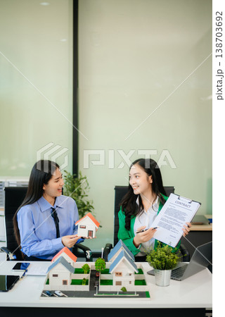Signing a contract. Client and broker agent, lease agreement, successful deal and  Young business sitting 138703692