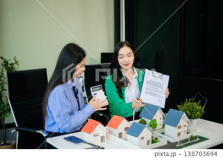 Signing a contract. Client and broker agent, lease agreement, successful deal and  Young business sitting 138703694