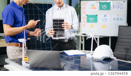 Engineer Team Meeting of Sustainable on a solar and wind energy project, discussing innovation Engineer Team Meeting of Sustainable on a solar and wind energy project, discussing innovation 138704459