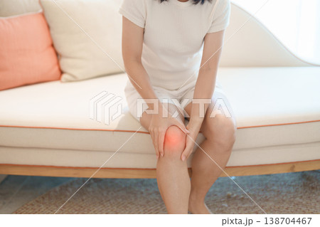 woman having knee ache and muscle pain due to Runners Knee or Patellofemoral Pain Syndrome, osteoarthritis, arthritis, rheumatism and Patellar Tendinitis. health and medical concept woman having knee ache and muscle pain due to Runners Knee or Patellofemoral Pain Syndrome, osteoarthritis, arthritis, rheumatism and Patellar Tendinitis. health and medical concept 138704467