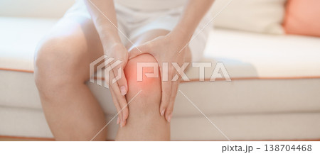 woman having knee ache and muscle pain due to Runners Knee or Patellofemoral Pain Syndrome, osteoarthritis, arthritis, rheumatism and Patellar Tendinitis. health and medical concept woman having knee ache and muscle pain due to Runners Knee or Patellofemoral Pain Syndrome, osteoarthritis, arthritis, rheumatism and Patellar Tendinitis. health and medical concept 138704468