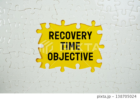 Jigsaw puzzle with a missing piece with "Recovery Time Objective" on yellow background Jigsaw puzzle with a missing piece with "Recovery Time Objective" on yellow background 138705024