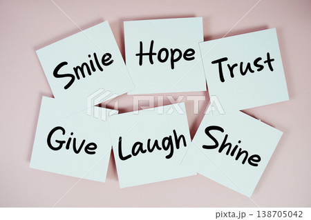 Smile, Hope, Trust, Give, Laugh, Shine message written on paper notes Positive Mindset concept Smile, Hope, Trust, Give, Laugh, Shine message written on paper notes Positive Mindset concept 138705042