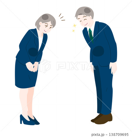 笑顔でお辞儀を交わす職場の男女スタッフ 笑顔でお辞儀を交わす職場の男女スタッフ 138709695