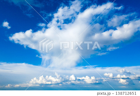 blue sky background with tiny clouds 138712651