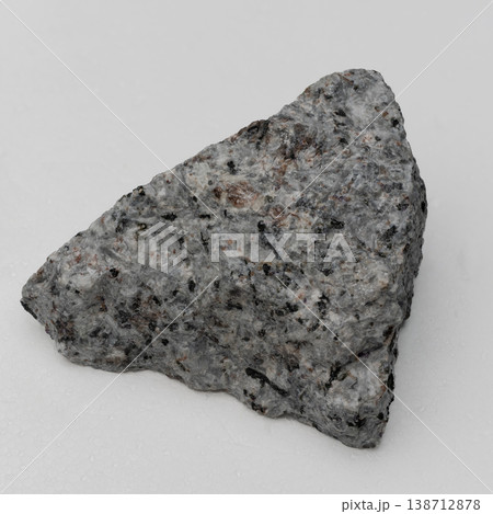 Sodalite Syenite Rock Fragment with Speckled Grey and White Mineral Texture on Neutral Background Sodalite Syenite Rock Fragment with Speckled Grey and White Mineral Texture on Neutral Background 138712878