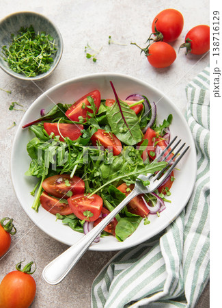 Fresh green salad with tomatoes and microgreens Fresh green salad with tomatoes and microgreens 138716129