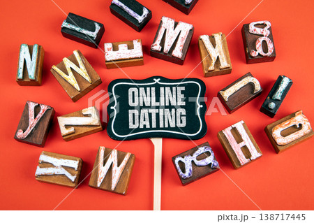 Online Dating Sign with Wooden Letters on Bright Red Background Online Dating Sign with Wooden Letters on Bright Red Background 138717445