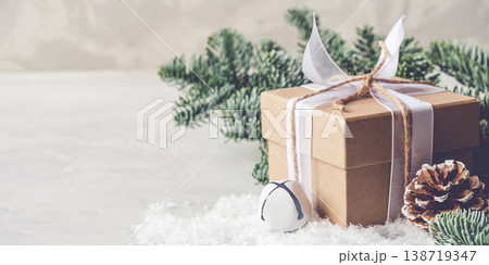 Christmas gift box in the snow. Christmas gift box in the snow. 138719347
