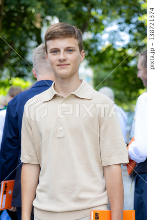 Confident Teenage Boy Portrait Outdoors In Casual Neutral Clothing Natural Light Confident Teenage Boy Portrait Outdoors In Casual Neutral Clothing Natural Light 138721374