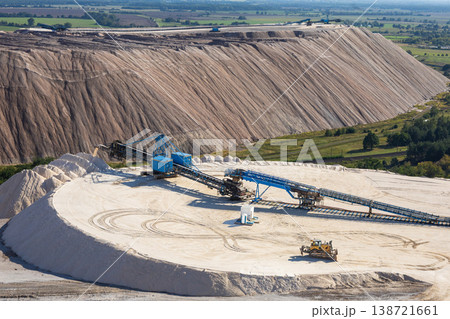 Industrial Salt Mining Site with Conveyor Systems, Large White Salt Mountain and Heavy Machinery Industrial Salt Mining Site with Conveyor Systems, Large White Salt Mountain and Heavy Machinery 138721661