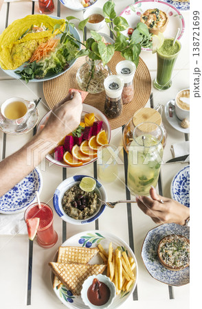 mixed western healthy food meal on restaurant table outdoors in singapore restaurant mixed western healthy food meal on restaurant table outdoors in singapore restaurant 138721699