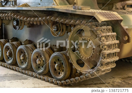 Camouflage Armored Tank Track And Wheel Mechanism Military Vehicle Close View Camouflage Armored Tank Track And Wheel Mechanism Military Vehicle Close View 138721775