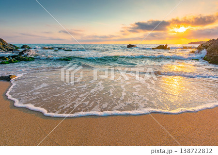 sandy beach of a black sea at sunrise. bulgaria scene on hot summer vacation season. beautiful view of waves washing the sand in morning light. generic image of seascape and sky for background 138722812